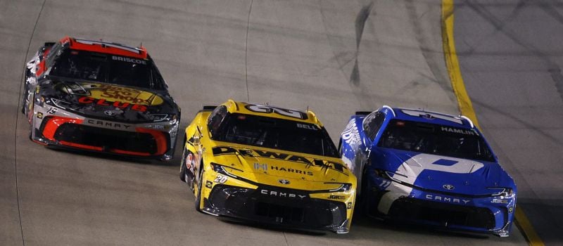 The three Joe Gibbs Racing teammates got close as they raced in the closing laps of Sunday's Cracker Barrel 400 at Nashville Superspeedway. Hamlin (11) eventually held off Bell (20) and Briscoe (19) to take the victory.
