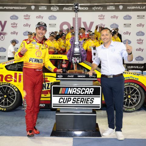 Nashville Superspeedway GM Matt Greci congratulates 2024 winner Joey Logano in Victory Lane. Logano is among pre-race favorites for victory in Sunday's Cracker Barrel 400 at the 1.33-mile concrete oval.